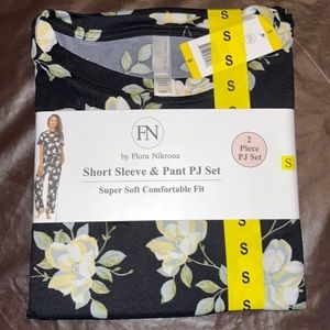 Black shirt sleeves and pants pj set with flowers on them